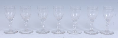 Lot 2249 - * A set of seven circa 1790 wine glasses, the...