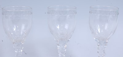 Lot 2249 - * A set of seven circa 1790 wine glasses, the...