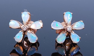Lot 2732 - A pair of 9ct rose gold, opal and diamond...