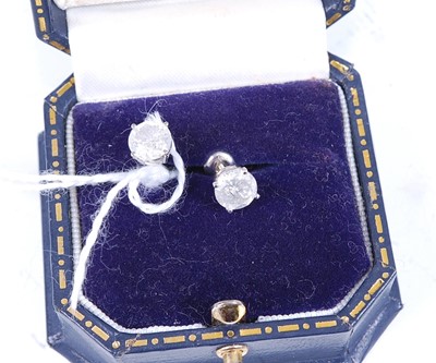 Lot 2725 - A pair of white metal diamond single stone...