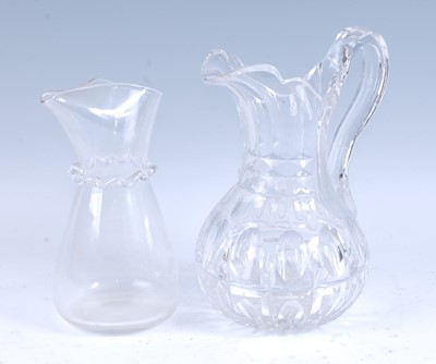 Lot 2252 - * A George III lead glass water jug, the body...