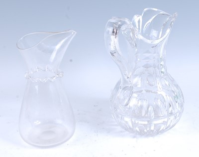 Lot 2252 - * A George III lead glass water jug, the body...