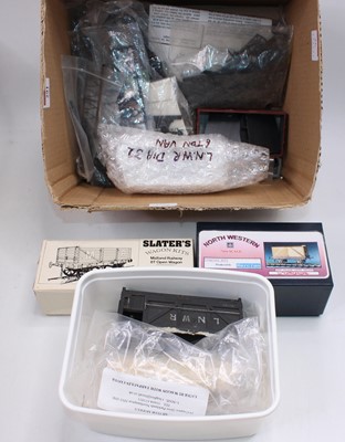 Lot 291 - Box containing 0 gauge wagon kit parts, one...
