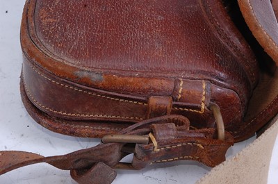 Lot 283 - A brown stitched leather cartridge bag, naming...