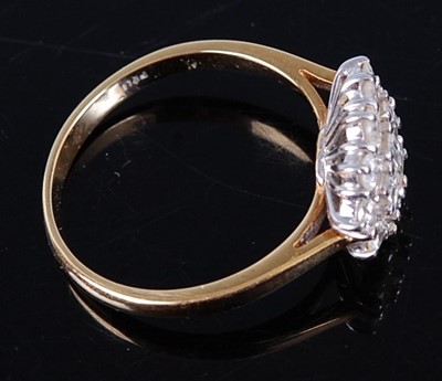 Lot 2684 - An 18ct gold diamond ring, arranged as three...