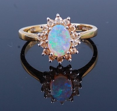 Lot 2687 - An 18ct yellow gold, opal and diamond flower...