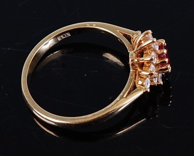 Lot 2688 - An 18ct gold, ruby and diamond flower head...