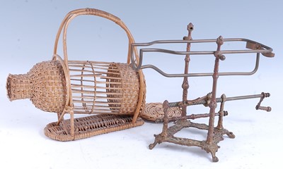 Lot 2229 - * A late 19th century brass bottle cradle, the...