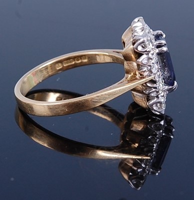 Lot 2735 - An 18ct yellow and white gold, sapphire and...