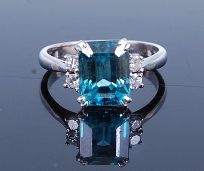 Lot 2737 - A white metal, topaz and diamond dress ring,...
