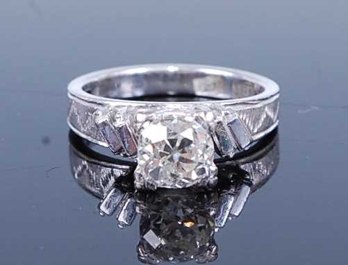 Lot 2746 - A white metal diamond single stone ring,...