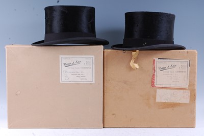 Lot 279 - A black brushed silk top hat, bearing a label...