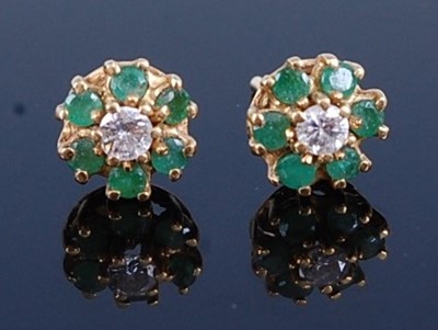 Lot 2765 - A pair of 18ct yellow gold, emerald and...