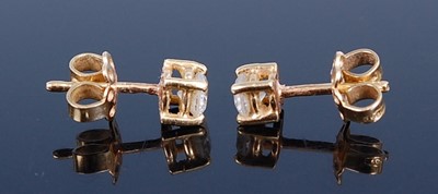 Lot 2775 - A pair of 18ct gold diamond ear studs, the...