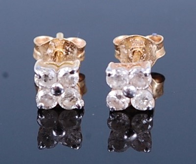 Lot 2782 - A pair of 18ct gold diamond ear studs, each...