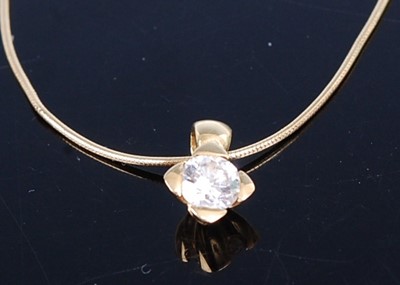 Lot 2787 - A contemporary yellow metal diamond pendant,...