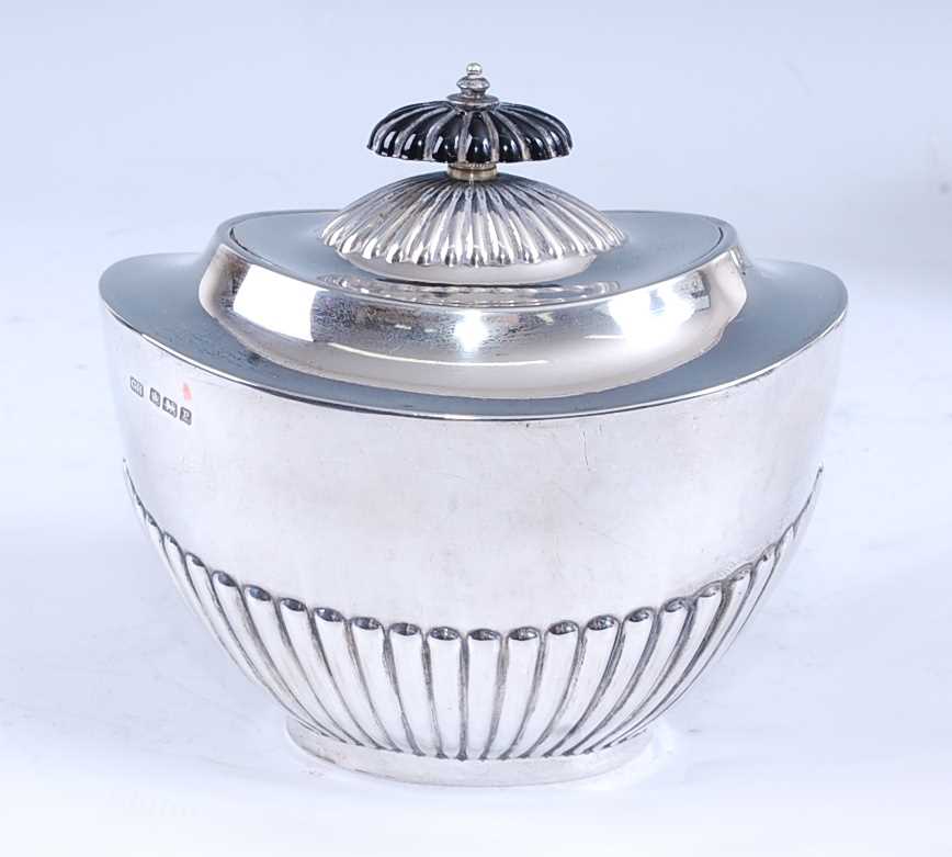 Lot 2164 - A George V silver tea caddy, of half-gadrooned...