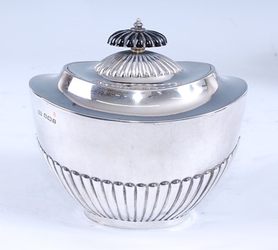 Lot 2164 - A George V silver tea caddy, of half-gadrooned...