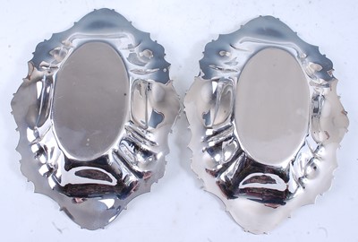Lot 2167 - A pair of Art Nouveau silver bonbon dishes,...