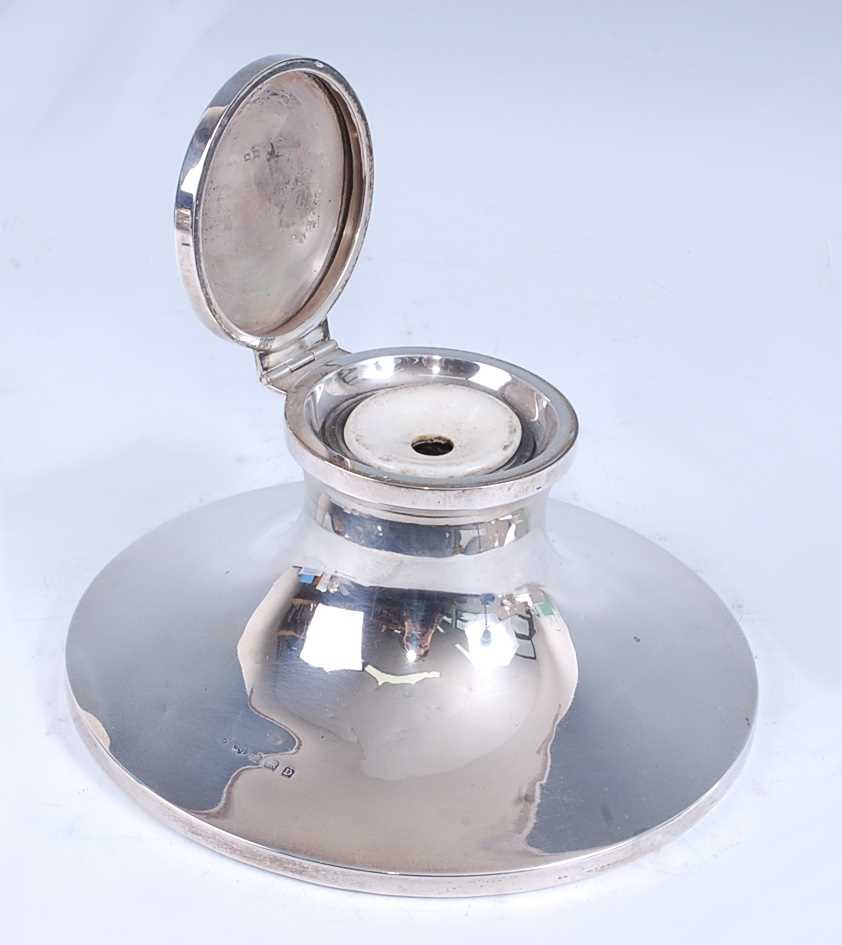 Lot 225 - A George V silver capstan inkwell, of flaring...