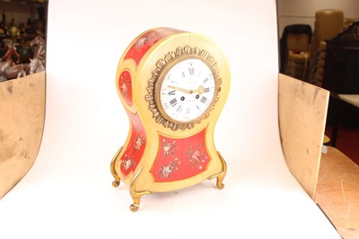 Lot 9 - A French balloon shape mantel clock, the...