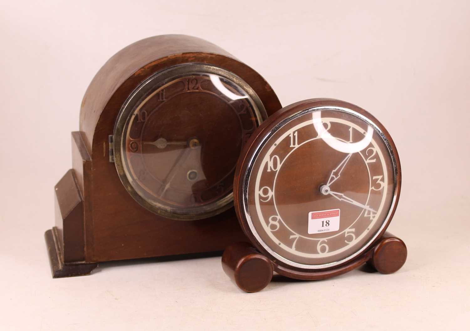 Lot 18 - A 1950s oak cased mantel clock, having a...