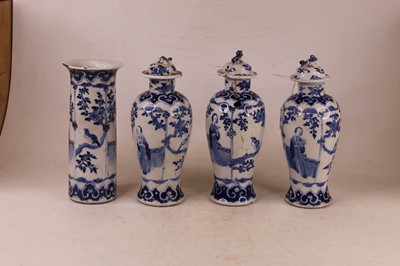 Lot 19 - A garniture of three Chinese export blue and...