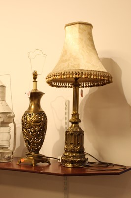 Lot 25 - A modern brass table lamp, of pierced baluster...