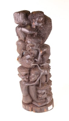 Lot 50 - A large Makonde ebony 'tree of life' carving,...