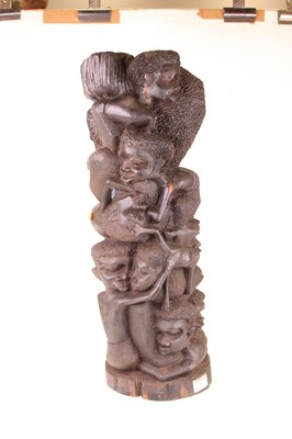 Lot 50 - A large Makonde ebony 'tree of life' carving,...