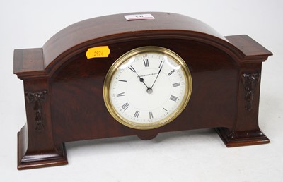 Lot 93 - A mahogany cased mantel clock, the circular...