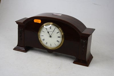 Lot 93 - A mahogany cased mantel clock, the circular...