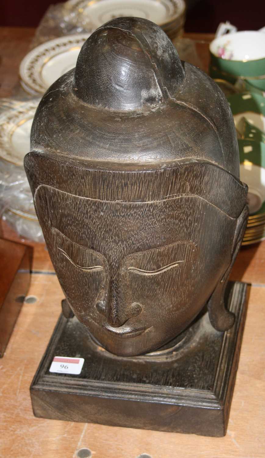 Lot 96 - A large carved hardwood bust of Guanyin, on...