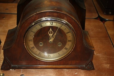 Lot 105 - A 1930s walnut cased mantel clock, having...
