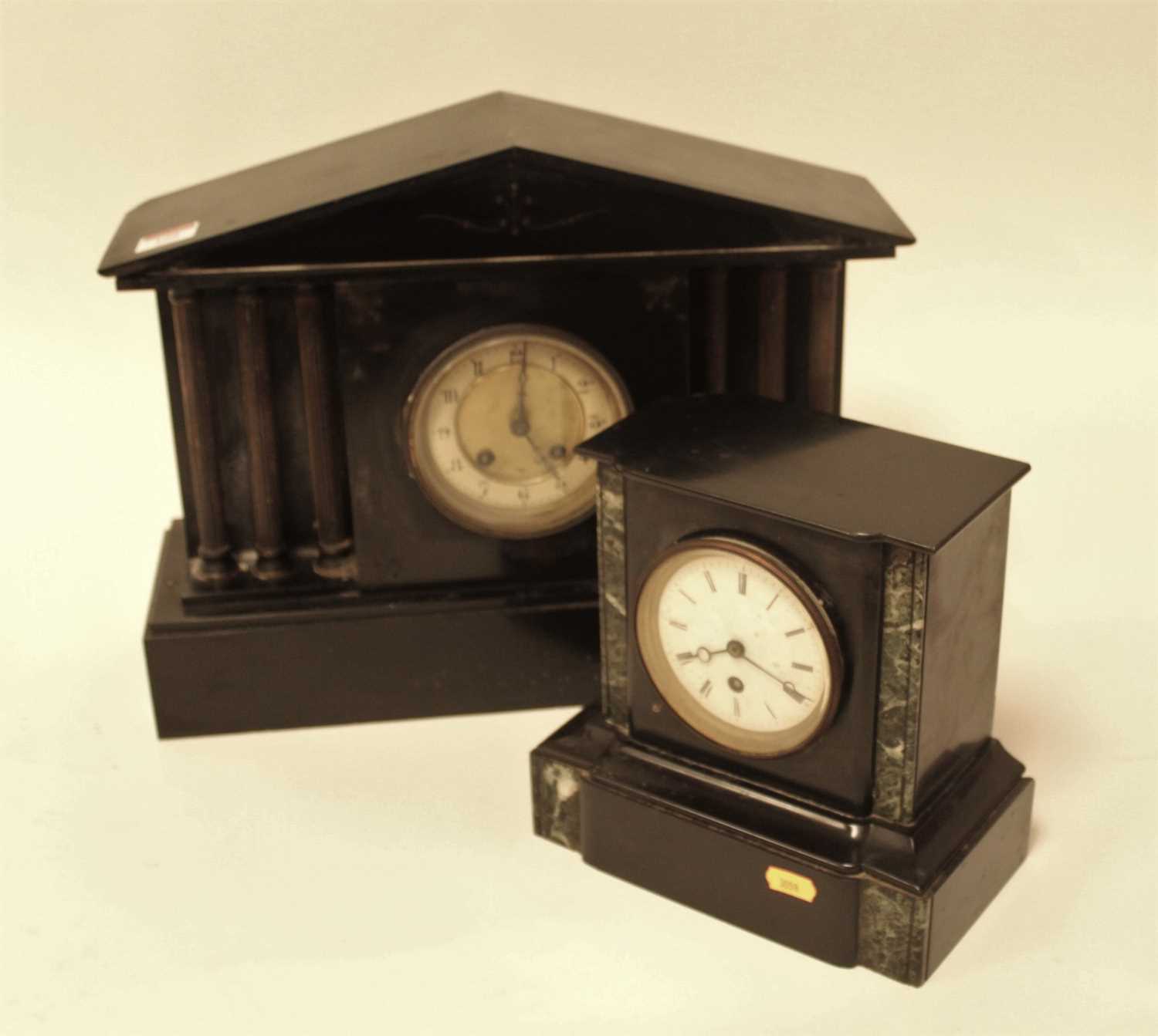 Lot 108 - A late Victorian black slate mantel clock, of...