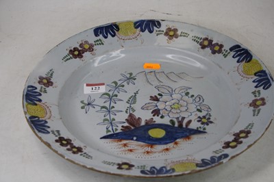Lot 122 - An 18th century English Delft charger, the...