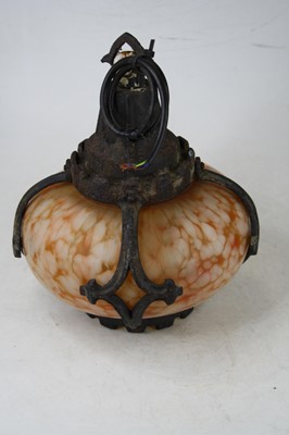 Lot 124 - An early 20th century light fitting, having...
