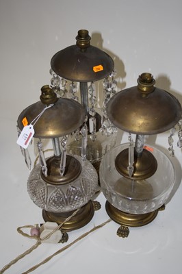 Lot 127 - A pair of table lamps, each having a domed top...