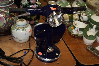 Lot 138 - A modern table lamp in the form of a Vespa...