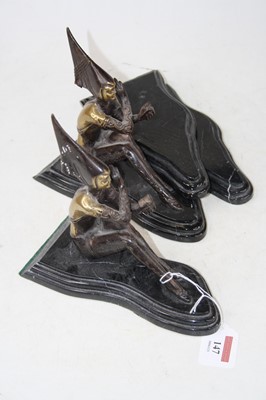 Lot 147 - A pair of polished marble book-ends, of...
