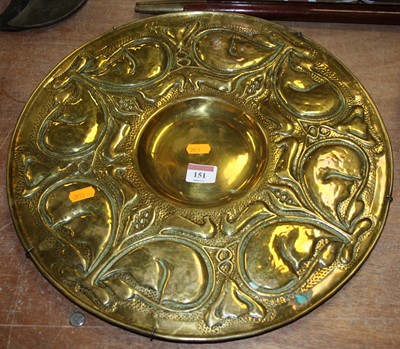 Lot 151 - An Art Nouveau brass charger, of circular form,...