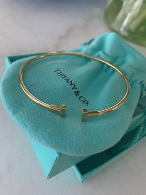 Lot 3 - Tiffany T Gold Wire Bracelet   T is for...