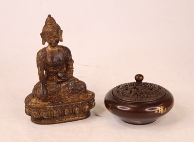 Lot 204 - A reproduction gilt metal figure of a Tibetan...