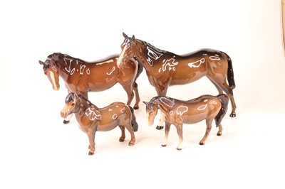 Lot 205 - A collection of four Beswick animal figures,...