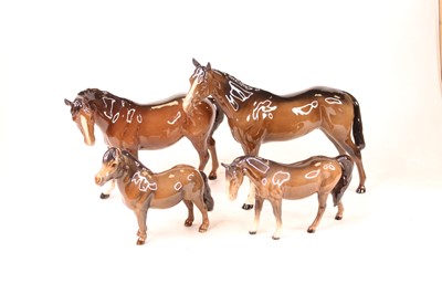 Lot 205 - A collection of four Beswick animal figures,...