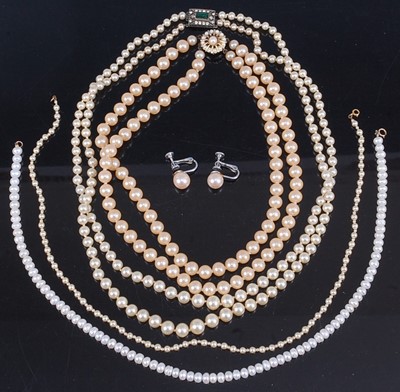 Lot 389 - A faux pearl double string choker together...
