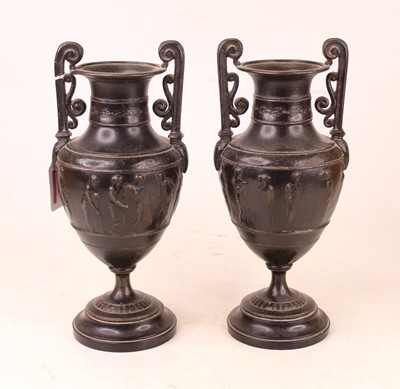 Lot 213 - A pair of bronzed vases, each of urn shape...