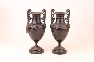 Lot 213 - A pair of bronzed vases, each of urn shape...