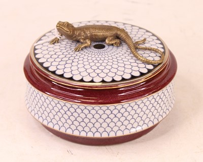Lot 218 - A modern jar and cover, of square circular...