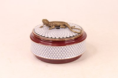 Lot 218 - A modern jar and cover, of square circular...